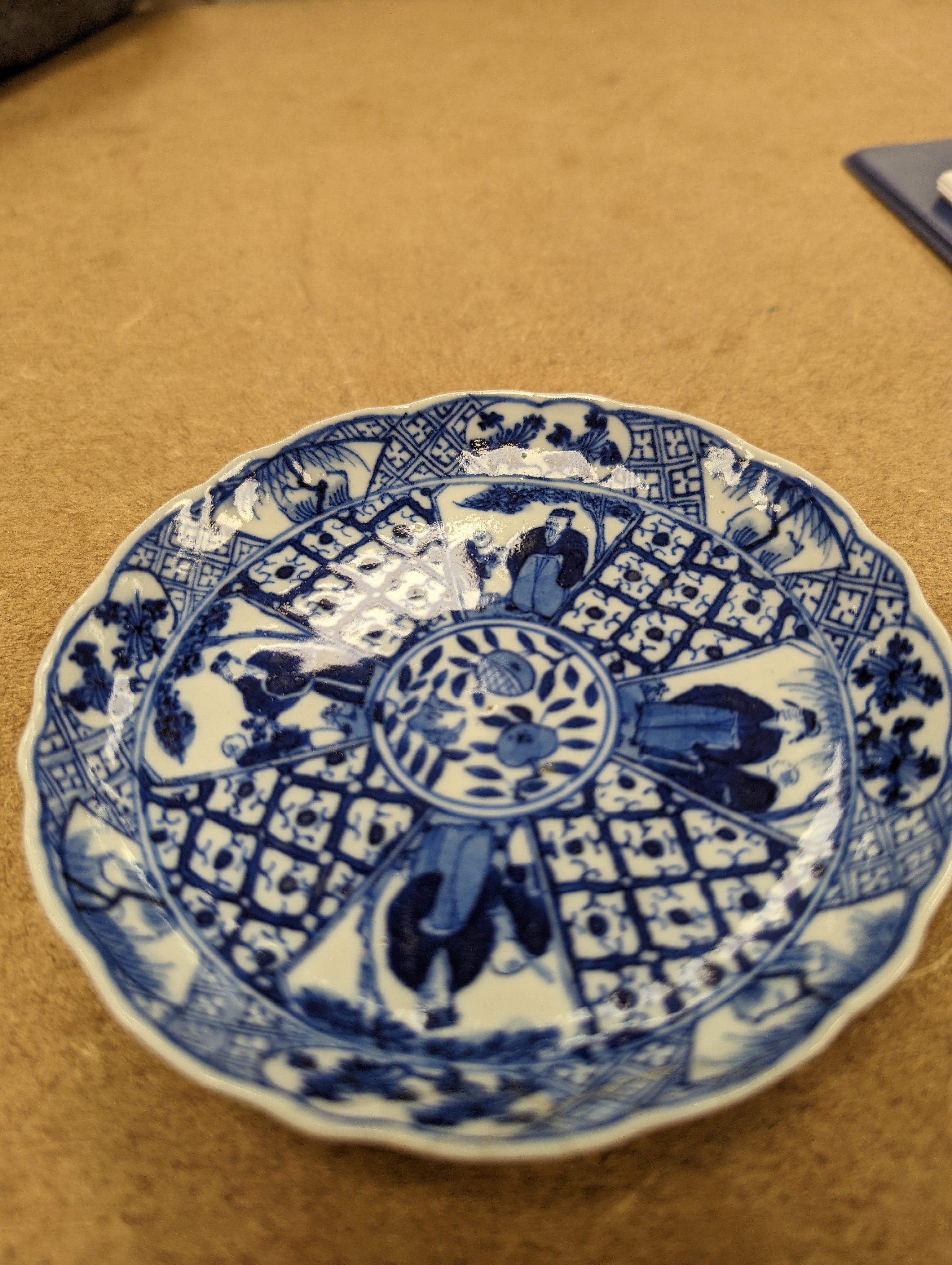 Two Chinese porcelain saucer dishes and an enamelled porcelain vase, 18th century and later, 12.5cm